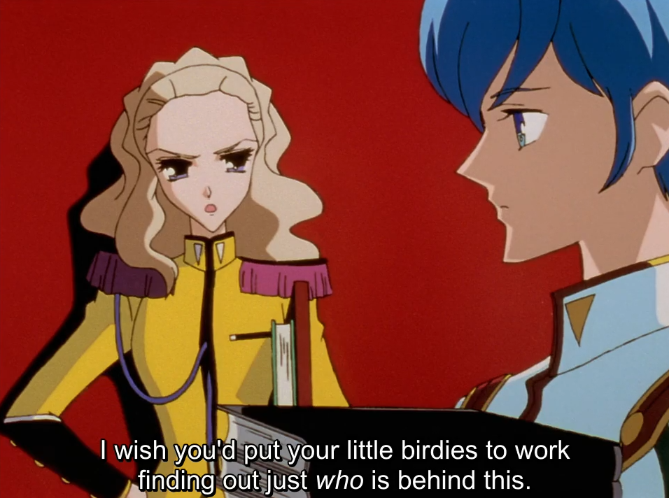 Nanami, in her yellow student council uniform, frowns at Miki, whose blue-haired profile fills the foreground against a red background. The subtitle reads "I wish you'd put your little birdies to work finding out just who is behind this."