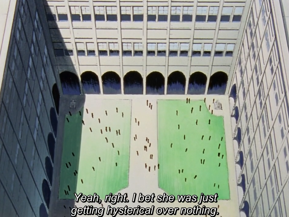 An overhead view of the academy's courtyard: two green lawns surrounded by tall arched buildings, with tiny students scattered across them. The subtitle reads "Yeah, right. I bet she was just getting hysterical over nothing."