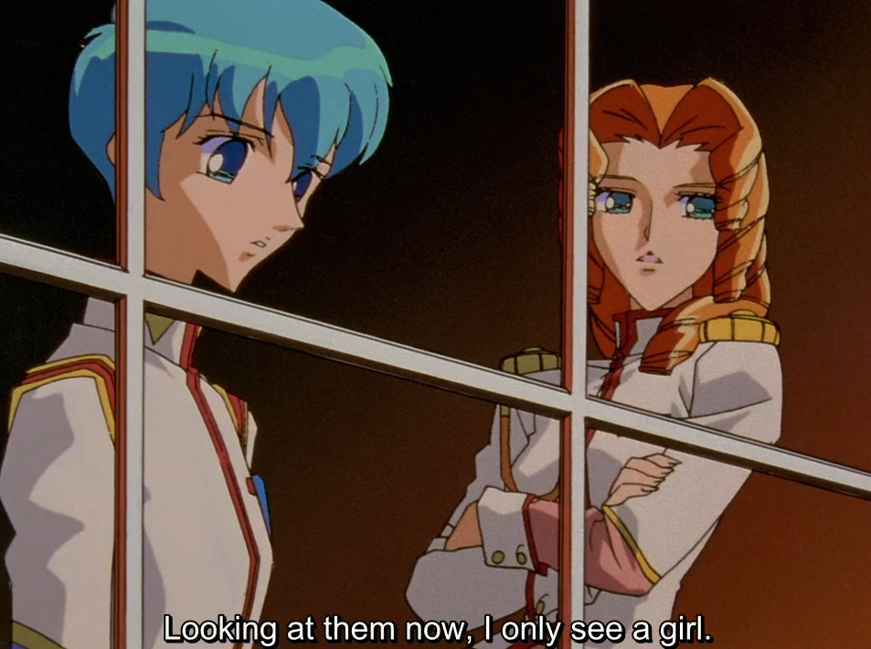 Miki and Juri, in their white student council uniforms, seen through the bars of a window frame; Juri stands with her arms crossed. The subtitle reads "Looking at them now, I only see a girl."